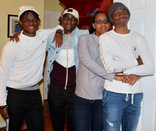 Melissa Worthy with her three adult sons.