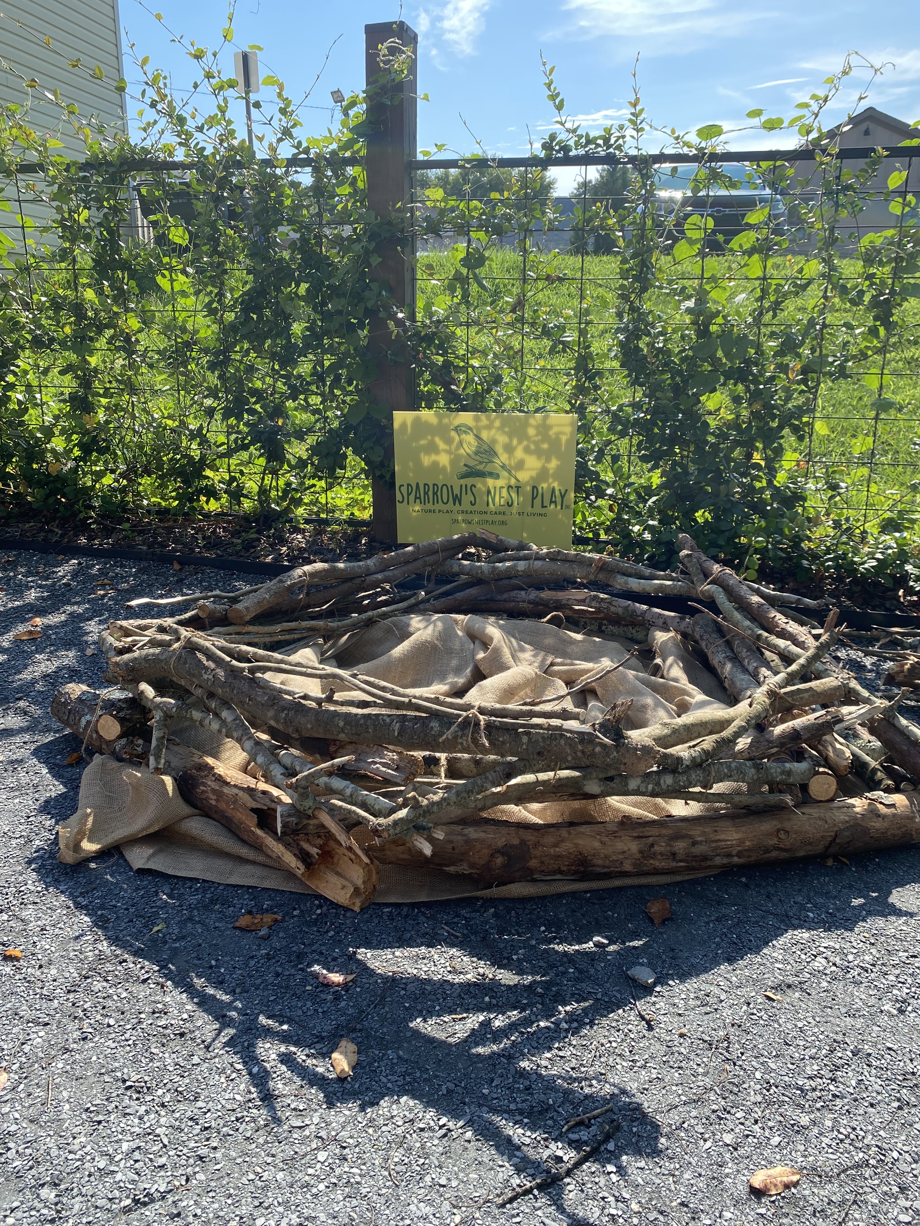 A burlap base and bundles of sticks come together to make a fun bird nest and a fun bird project.