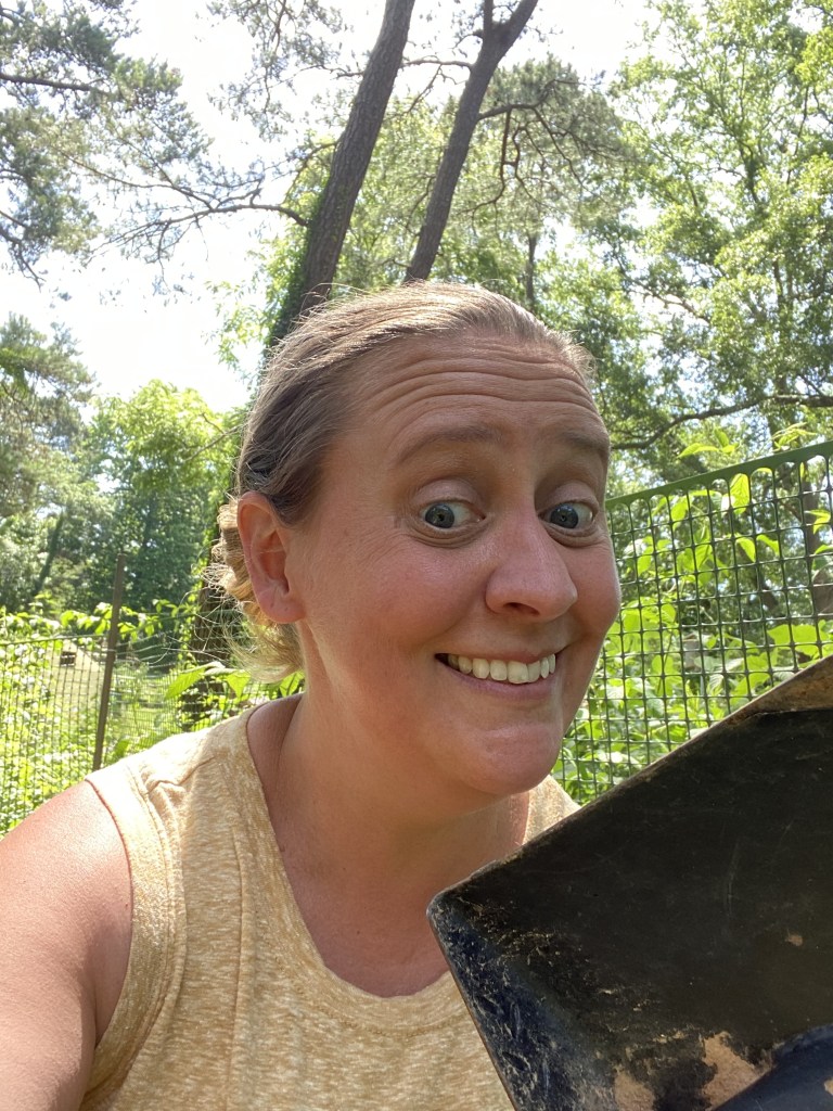 Vangie smiling with shovel