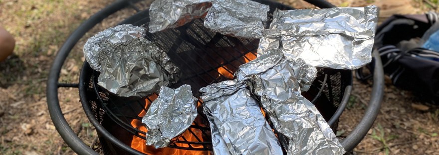 campfire with foil packets