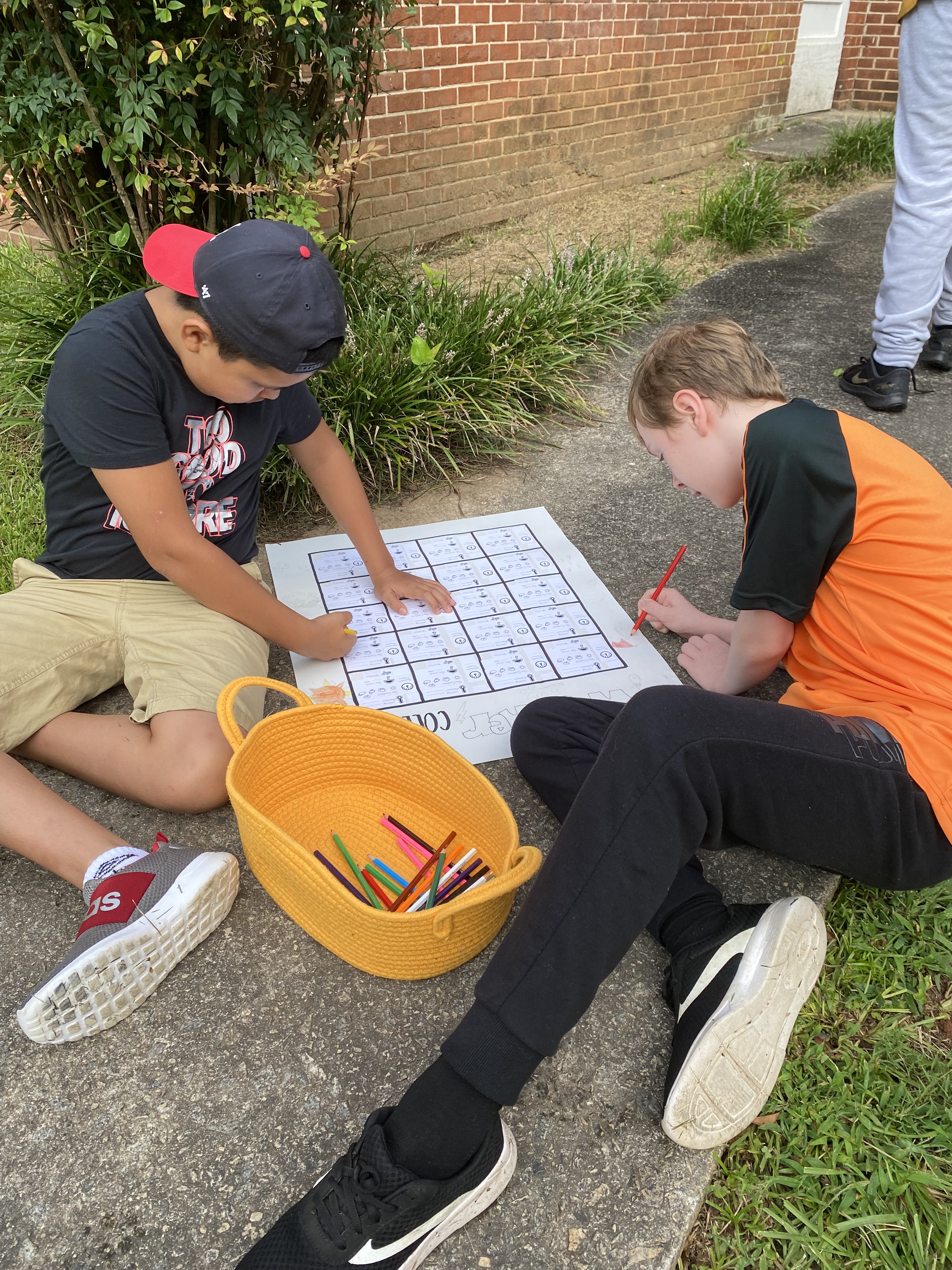 boys decorate weather calendar